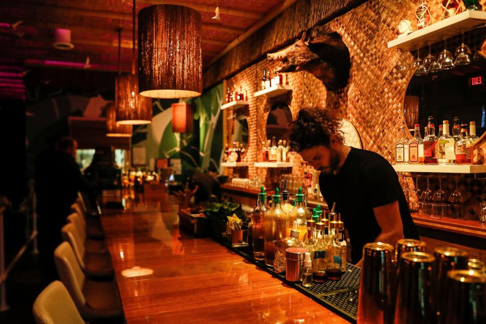 Located off of Audubon Road in Irvington, the tiki inspired bar Strange Bird serves a tropical twist to Indianapolis featuring drinks with pineapples, oranges, and flowers and dishes such as the king salmon poke fries and a carrot szechuan bisque. 