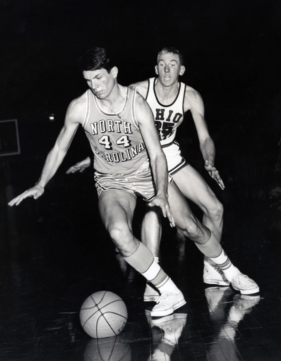 North Carolina Tar Heels guard Larry Miller (44) in action against Ohio State Buckeyes guard Bill Hosket (25) during the 1966 season. Malcolm Emmons-USA TODAY Sports