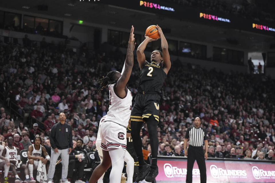 Vanderbilt forward Ven-Allen Lubin (2) shoots the ball over South Carolina guard Zachary Davis (12) during the first half of an NCAA college basketball game Saturday, Feb. 10, 2024, in Columbia, S.C. (AP Photo/David Yeazell)