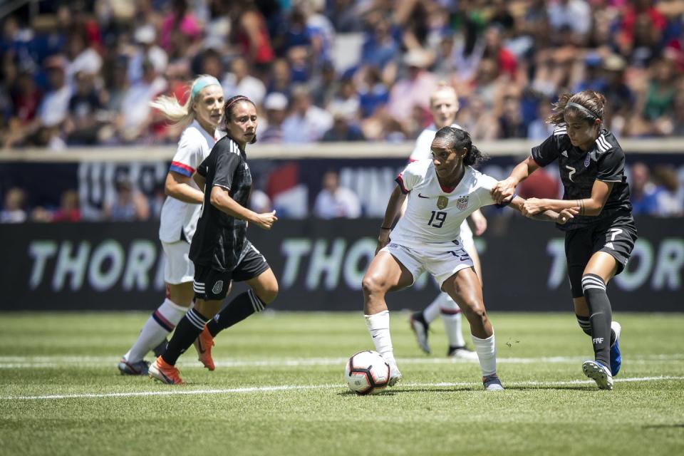 <span class="caption">The U.S. women’s soccer team plays Mexico.</span> <span class="attribution"><a class="link " href="https://www.gettyimages.com/detail/news-photo/crystal-dunn-of-united-states-tries-to-break-free-from-news-photo/1232168378?adppopup=true" rel="nofollow noopener" target="_blank" data-ylk="slk:Ira L. Black/Corbis via Getty Images;elm:context_link;itc:0;sec:content-canvas">Ira L. Black/Corbis via Getty Images</a></span>