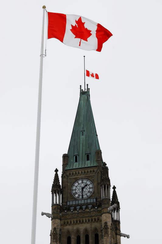 The Canadian flag flies at half-mast on the Peace Tower, to honour victims of Flight PS752 from Tehran to Kyiv that crashed shortly after takeoff, on Parliament Hill in Ottawa