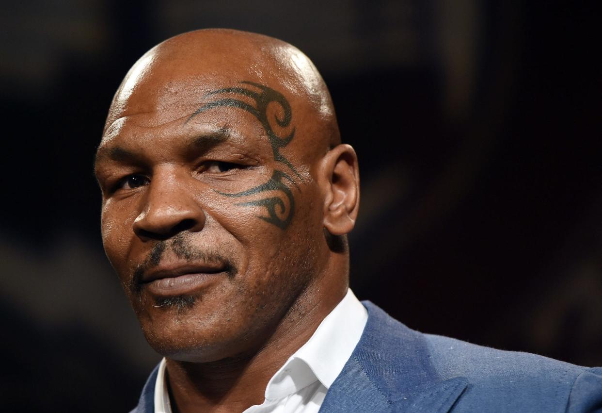 Former boxer Mike Tyson inducts Evander Holyfield (not pictured) into the Nevada Boxing Hall of Fame at the second annual induction gala at the New Tropicana Las Vegas