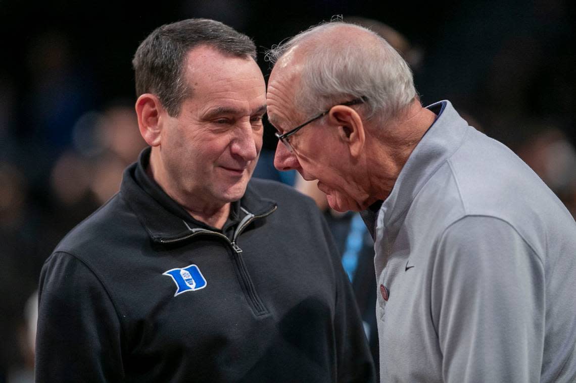 Duke coach Mike Krzyzewski talks with Syracuse coach Jim Boeheim prior to their game in the quarterfinals of the ACC Tournament on Thursday, March 10, 2022 at Barclays Center in Brooklyn, N.C.