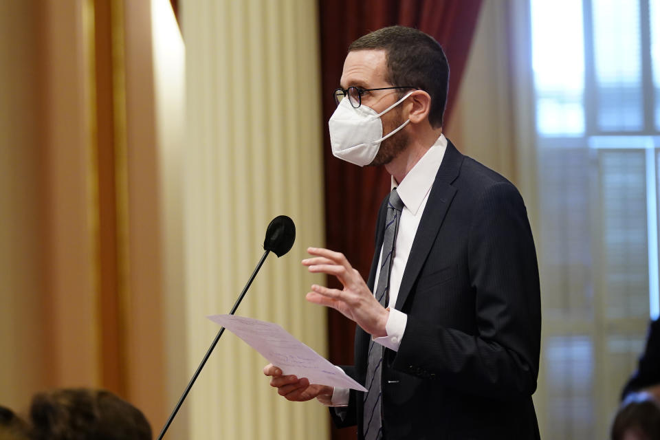 State Sen. Scott Wiener, D-San Francisco, addresses the state Senate at the Capitol in Sacramento, Calif., Tuesday, Jan. 18, 2022. Wiener is introducing, Friday, Jan. 21, 2022 a bill that would allow children ages 12 and up to be vaccinated without their parents consent. (AP Photo/Rich Pedroncelli)