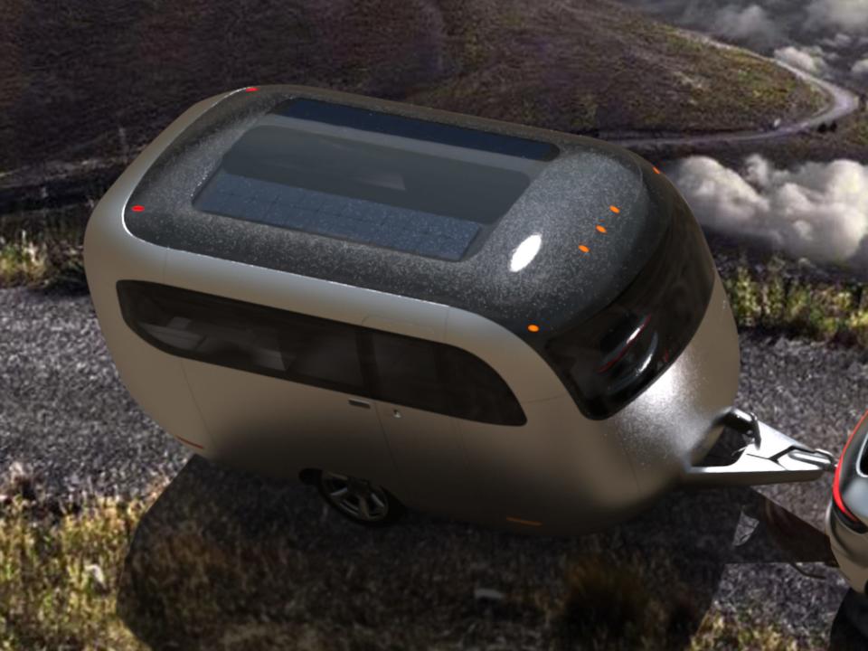 A rendering of the Airstream Studio F. A. Porsche Concept Travel Trailer on the road.