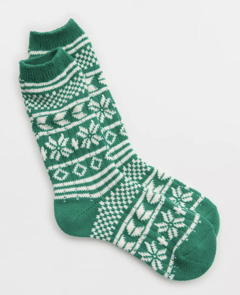 the green socks with white patterns