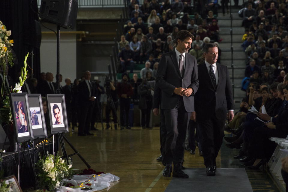 Canadian Prime Minister Justin Trudeau, left, arrives with Alberta Premier Jason Kenney during a memorial for the victims of the Ukrainian plane disaster in Iran this past week in Edmonton, Alberta, Sunday, Jan. 12, 2020. (Todd Korol/The Canadian Press via AP)