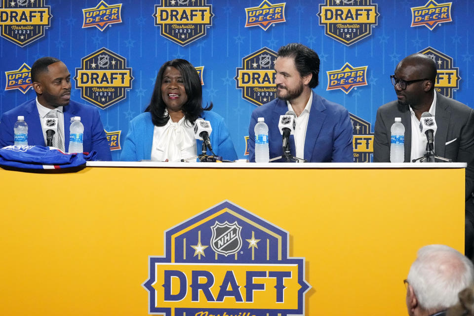 Tennessee State University Athletic Director Mikki Allen, President Glenda Glover, NHL Vice President Kevin Westgarth and former NHL player Anson Carter announce the school's plan to become the first historically Black college and university to introduce ice hockey during a news conference, Wednesday, June 28, 2023, in Nashville, Tenn. (AP Photo/George Walker IV)
