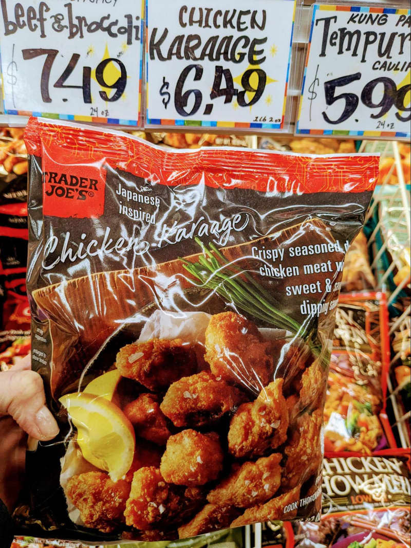 Someone holding package of Trader Joe's Chicken Karaage.