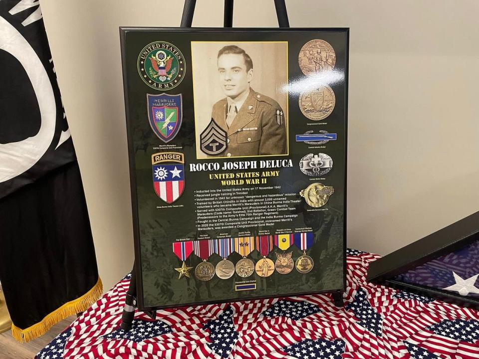A plaque dedicated to Rocco DeLuca, who passed away Oct. 2021. He was posthumously given a Congressional Gold Medal Wednesday for his service with Merrill's Marauders, a U.S. Army Unit from World War II that fought against Japanese forces in and around Burma.