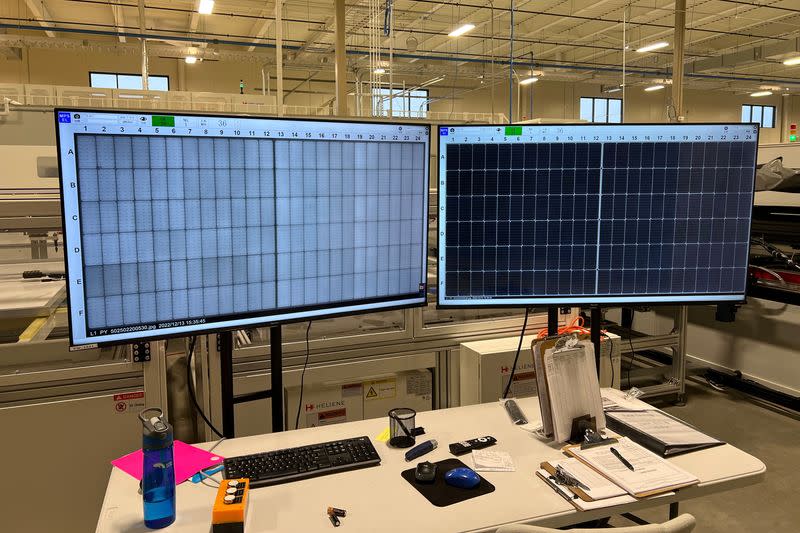 Panels are given the final electroluminescence and AI visual inspections at Heliene's solar panel factory in Iron Mountain