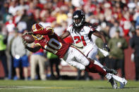 <p>Paul Richardson #10 of the Washington Redskins makes a catch in front of Desmond Trufant #21 of the Atlanta Falcons in the first quarter of the game at FedExField on November 4, 2018 in Landover, Maryland. (Photo by Joe Robbins/Getty Images) </p>