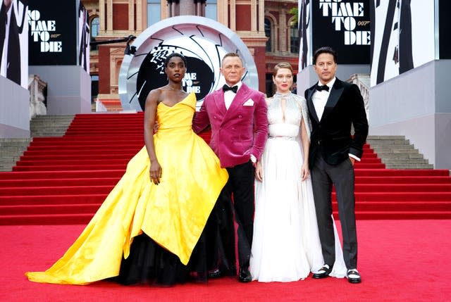 Lashana Lynch, Daniel Craig, Lea Seydoux and Cary Joji Fukunaga attending the world premiere of No Time To Die at the Royal Albert Hall in London