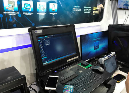 A scanner made by Hisign Technology that can glean data out of mobile phone apps such as Facebook and Twitter, and analyze user social network connections, is seen on display at the China International Exhibition on Police Equipment in Beijing, China May 15, 2018. REUTERS/Pei Li