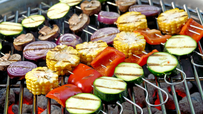 Vegetable skewers on grill