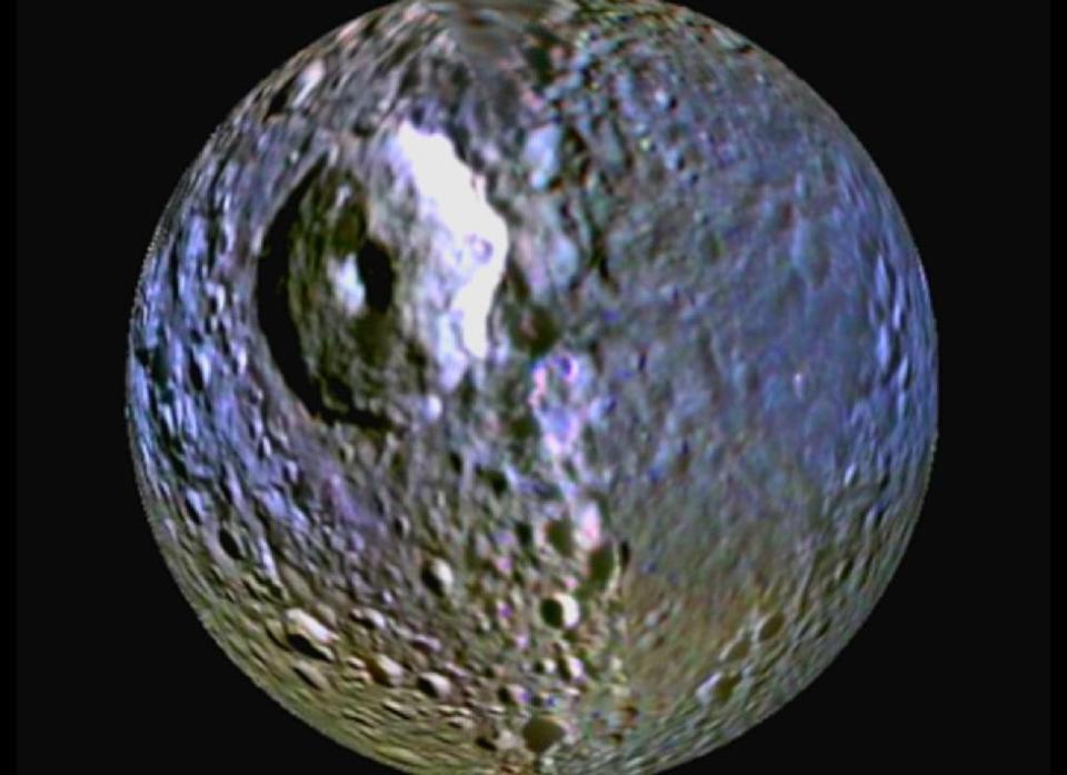 This color-enhanced view of Mimas from NASA shows a bluish band around the equator. Experts are unsure of the nature of this blue band, though <a href="http://www.nasa.gov/mission_pages/cassini/multimedia/pia13426.html" target="_hplink">NASA speculates</a> it could have something to do with the high-energy electrons that drift in an opposite direction to the flow of plasma in the magnetic bubble around <a href="http://www.mnn.com/eco-glossary/saturn" target="_hplink">Saturn</a>. <a href="http://solarsystem.nasa.gov/planets/profile.cfm?Object=Mimas" target="_hplink">As NASA reports</a>, Mimas is named for a giant who was killed by <a href="http://www.mnn.com/eco-glossary/mars" target="_hplink">Mars</a> in the war between the Titans and the gods of Olympus. It is the smallest and innermost of Saturn's major moons. Some note that its giant impact crater makes it similar to the Death Star featured in the "Star Wars" series.