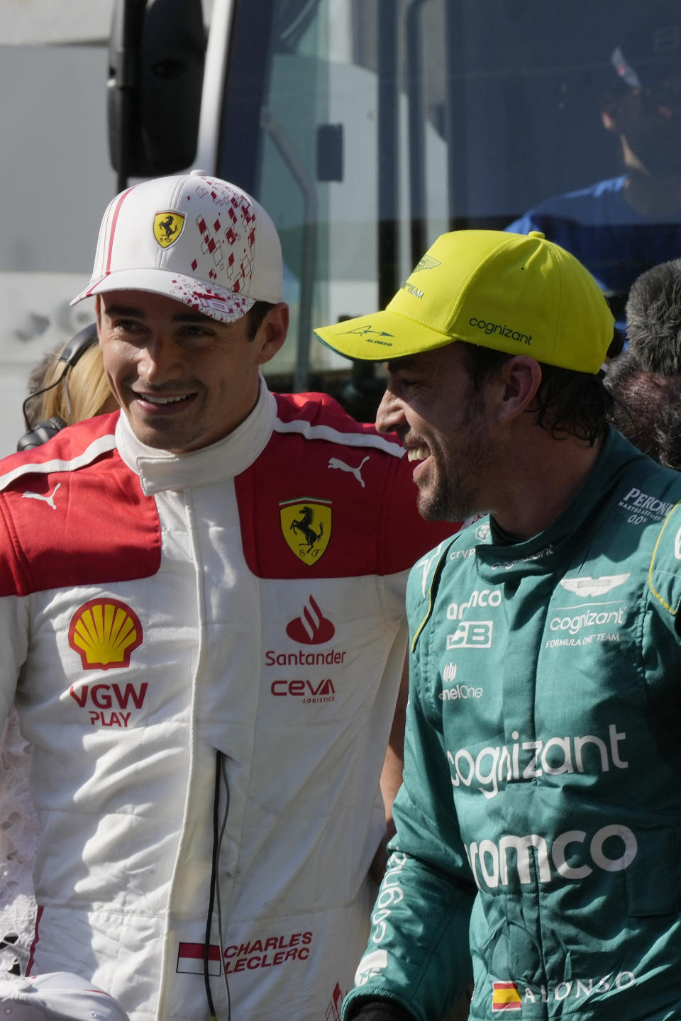 Ferrari driver Charles Leclerc of Monaco, left, speaks with Aston Martin driver Fernando Alonso of Spain at the end of the Formula One qualifying session at the Monaco racetrack, in Monaco, Saturday, May 27, 2023. The Formula One race will be held on Sunday. (AP Photo/Luca Bruno)