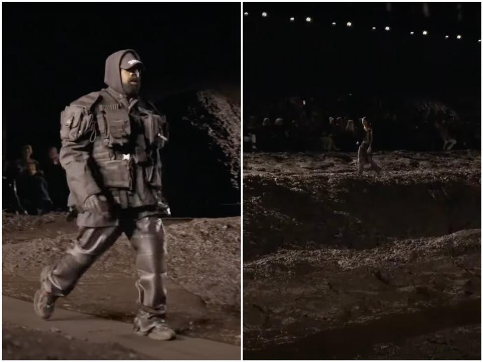 Kanye West walks on a muddy runway for the Balenciaga show in Paris, France