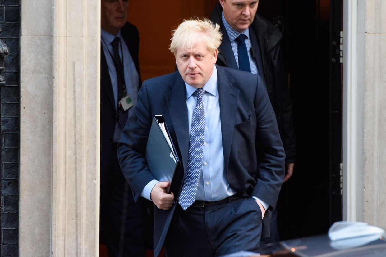 Prime Minister Boris Johnson leaves number 10 Downing Street, on his way to the House of Commons, which is sitting on a Saturday for the first time since 1982. Picture date: Saturday October 19, 2019. Photo credit should read: Matt Crossick/Empics