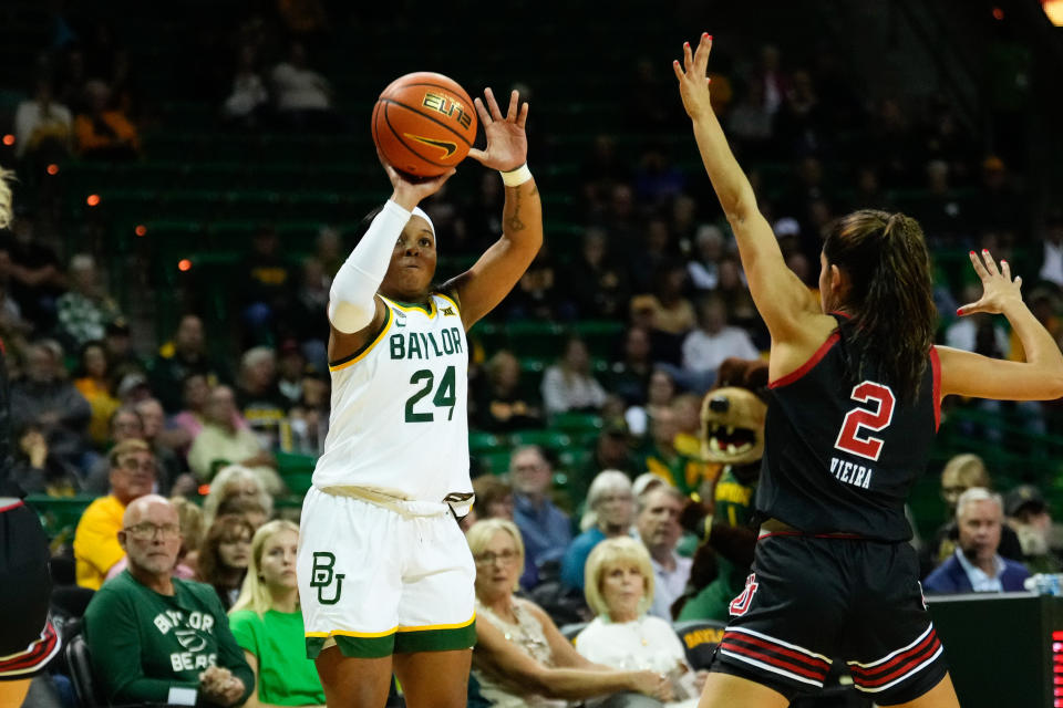 Baylor guard Sarah Andrews shoots a 3-pointer against Utah guard Ines Vieira during their game on Nov. 14, 2023, in Waco, Texas. Baylor is one of four unbeaten Big 12 teams. (Chris Jones/USA TODAY Sports)