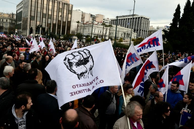 Protesters gather in front of the Greek parliament in Athens during a massive protest rally on February 4, 2016