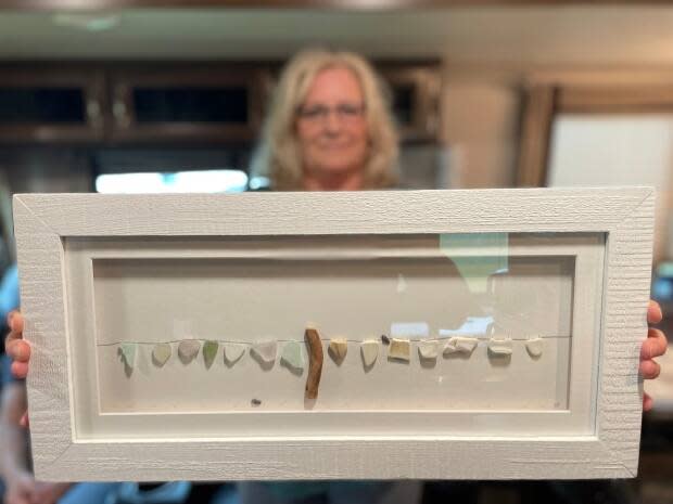 Alanda Rideout-Drost, who runs Island Pebble and Sea Glass Art, is trying to find a consistent location for small local vendors to set up in Charlottetown. (Tony Davis/CBC - image credit)