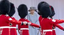 <p>For today's celebration, the Queen opted for a pale grey-blue coat with yellow details by her dresser Angela Kelly, which she paired with a matching hat, white gloves, and an aquamarine brooch. </p>