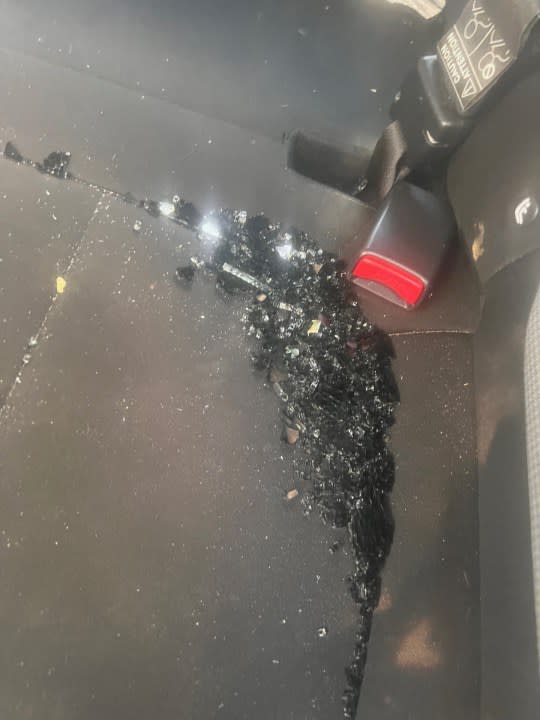 Shattered glass in the driver’s seat of Paez’ car. (Credit: Danielle Paez)