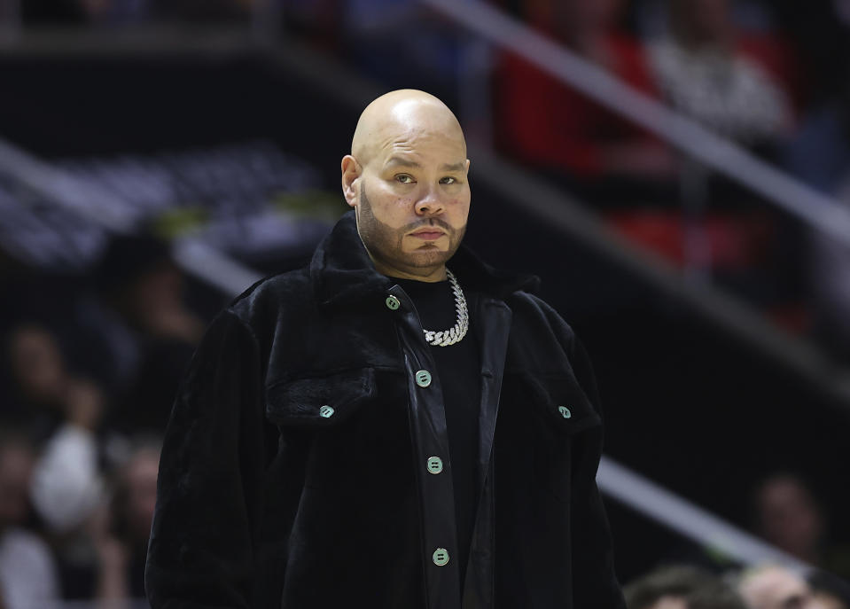 Entertainer Fat Boy watches during the first half of an NBA All-Star Celebrity Game, Friday, Feb. 17, 2023, in Salt Lake City. (AP Photo/Rob Gray)