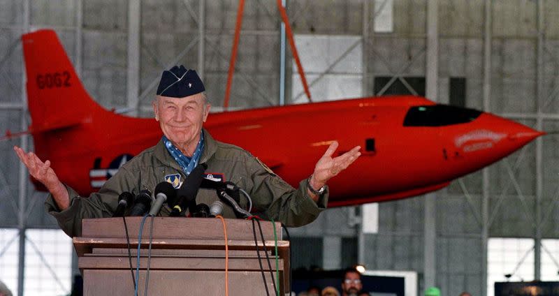 FILE PHOTO: Retired Air Force General Chuck Yeager answers questions from the media, during a press conference at Edwards Air Force Base