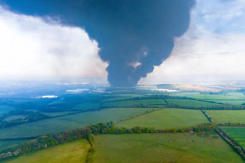 A tower of black smoke over Cannock on Thursday morning, May 9, after a major fire broke out at a parcel warehouse in the town -Credit:Matt Dutton of Drone Media Productions