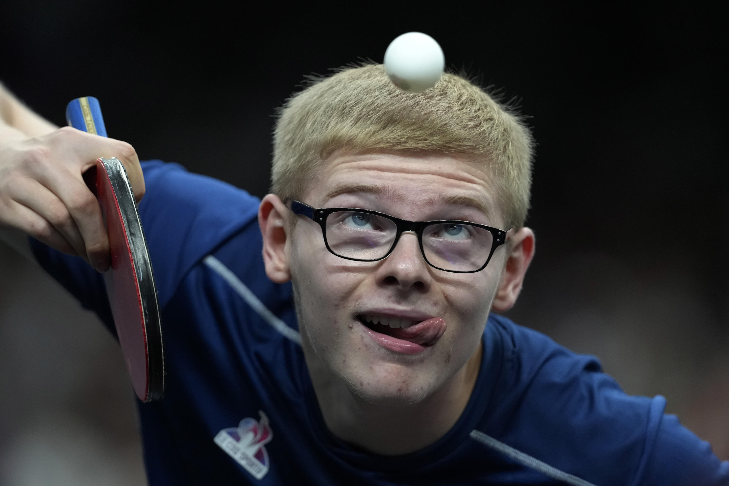 France's Felix Lebrun plays against Sweden's Anton Kallberg during a men's singles round of 32 table tennis game at the 2024 Summer Olympics on July 29, 2024, in Paris, France. (Petros Giannakouris/AP)