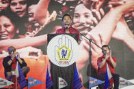 In this photo provided by the Manny Pacquiao MediaComms, Senator Manny Pacquiao, center, speaks during a national convention of his PDP-Laban party in Quezon city, Philippines on Sunday Sept. 19, 2021. Philippine boxing icon and senator Manny Pacquiao says he will run for president in the 2022 elections. (Manny Pacquiao MediaComms via AP)