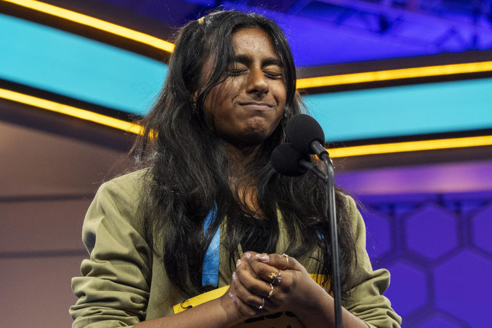 Ankita Balaji, 13, of Herndon, Va., reacts as she spells her word wrong during the quarterfinals of the Scripps National Spelling Bee, in Oxon Hill, Md., Wednesday, May 29, 2024. (AP Photo/Jacquelyn Martin)