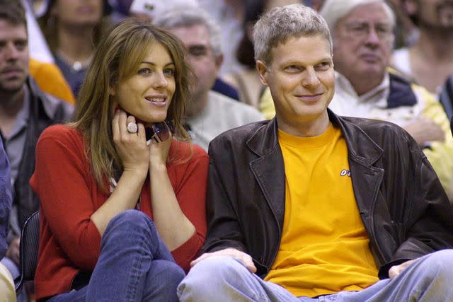 <p>Jim Ruymen/UPI/Shutterstock</p> Elizabeth Hurley and Steve Bing in 2001