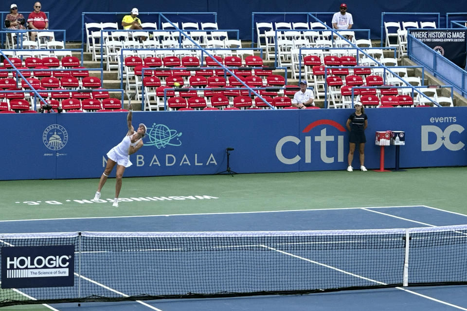 Defending champion Liudmila Samsonova of Russia serves against Danielle Collins in a first-round match at the DC Open tennis tournament in Washington on Monday, July 31, 2023. Samsonova won 6-1, 6-3. (AP Photo/Howard Fendrich)