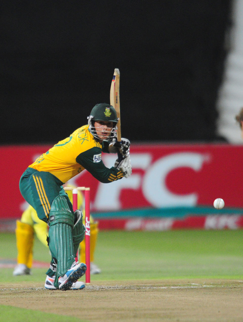 In this photo taken Wednesday, March 12, 2014, South Africa's Quinton de Kock plays at the wicket during their rain-delayed T20 cricket match against Australia in Durban, South Africa. (AP Photo)