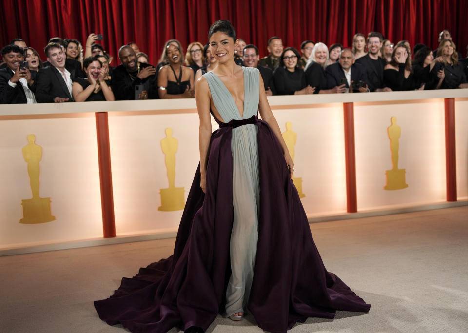 Monica Barbaro arrives at the Oscars on Sunday, March 12, 2023, at the Dolby Theatre in Los Angeles. (AP Photo/John Locher)