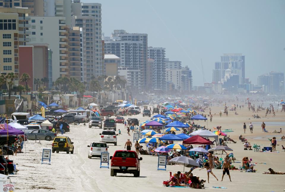 Memorial Day weekend beachgoers pack the sands of Daytona Beach Shores in 2021. After two summers of record-setting bed-tax numbers, Volusia County's tourism industry is weathering year-over-year declines this summer.