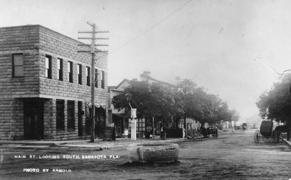 Sarasota’s lower Main Street as it looked in 1909 when Ralph and Ellen purchased their first
home here.