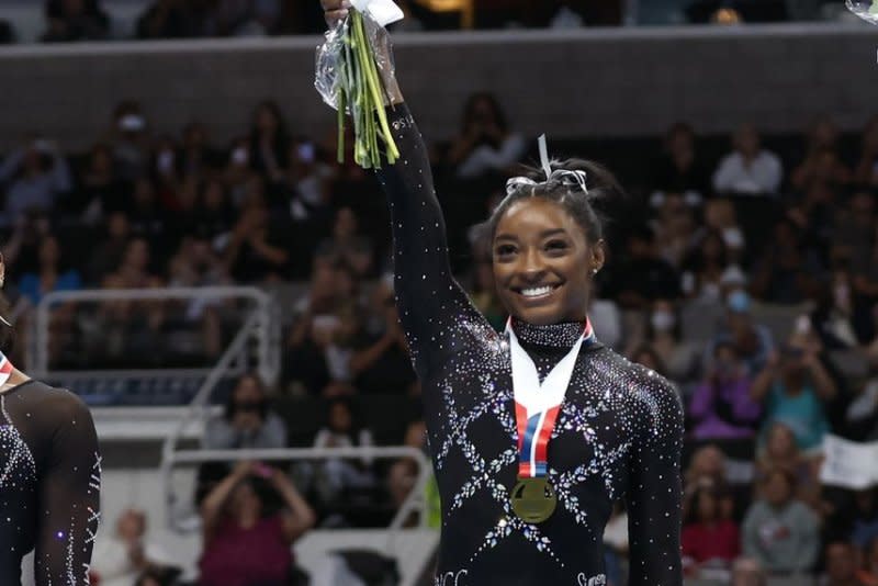 Simone Biles (C) wins first place, Shilese Jones (L) wins second place and Leanne Wong (R) wins third place overall in the U.S. Gymnastics Championships Women's Day 2 at SAP Center in San Jose, Calif., in 2023. File Photo by John G. Mabanglo/EPA-EFE