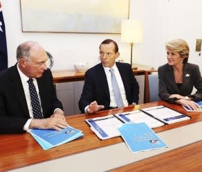 New team: Tony Abbott with Nationals leader Warren Truss and Liberal deputy leader Julie Bishop. Picture: Getty Images