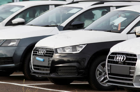 FILE PHOTO: Imported cars are parked in a storage area at Sheerness port, Sheerness, Britain, October 24, 2017. REUTERS/Peter Nicholls/File Photo