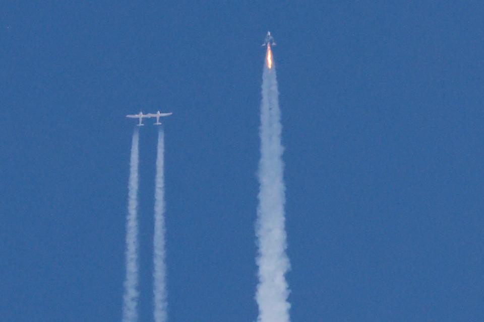 Virgin Galactic's passenger rocket plane VSS Unity begins ascent