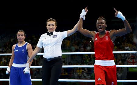 2016 Rio Olympics - Boxing - Final - Women's Fly (51kg) Final Bout 267 - Riocentro - Pavilion 6 - Rio de Janeiro, Brazil - 20/08/2016. Nicola Adams (GBR) of Britain celebrates after winning her bout against Sarah Ourahmoune (FRA) of France. REUTERS/Peter Cziborra