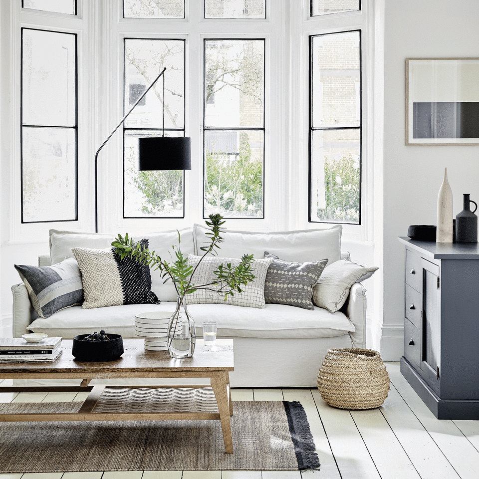 sofa in a living room with cushions