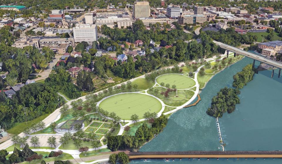 Ellen Kort Peace Park is located between the Fox River and West Water Street. The park's master plan calls for lighted trails, two circular gathering lawns, a peace ring, sculptures and gardens.