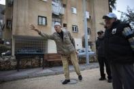 Members of the French community play boules at a club in Netanya, a city of 180,000 on the Mediterranean north of Tel Aviv, that has become the semi-official capital of the French community in Israel January 25, 2015. REUTERS/Ronen Zvulun