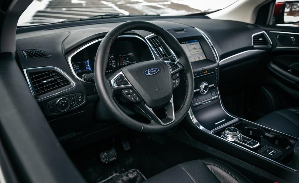 <p>Inside, Ford has also redesigned the SUV's center console, replacing its traditional shift lever with the rotary unit from the Fusion sedan.</p>