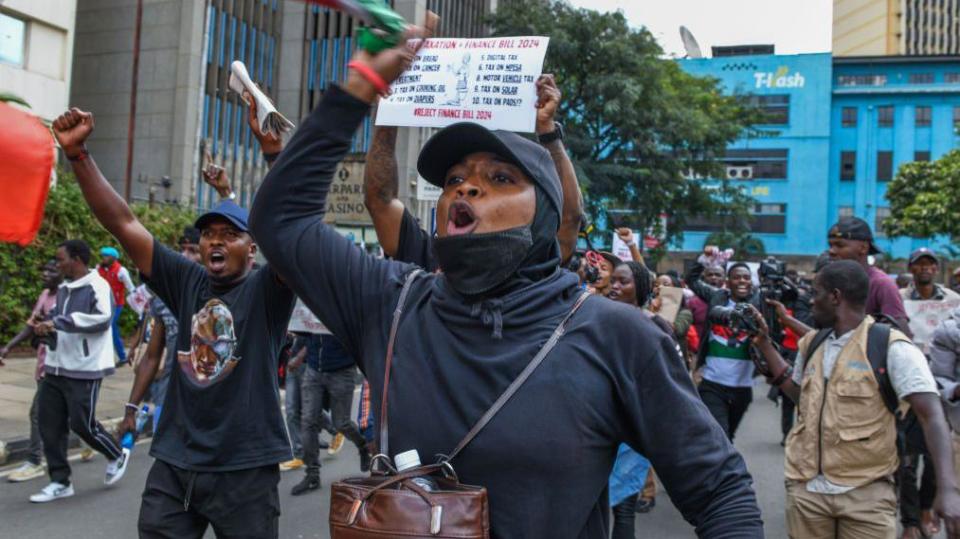  People gather to stage a demonstration against the Financial Bill for 2024 and tax increases as they march towards the parliament building in Nairobi, Kenya on 18 June.